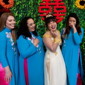 Blue ao dai with 3D flowers and pink pants
